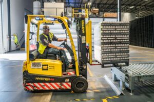 An example of smart warehousing with a man on a forklift